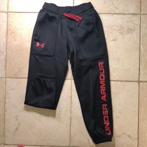 Boys Under Armour joggers in size small.